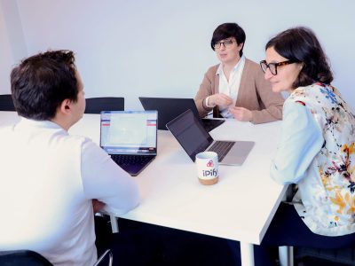 An iPify specialist taking notes