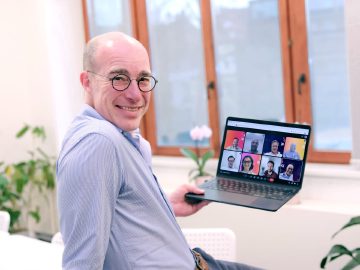 Two iPify coordinators working together