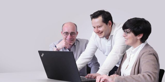 The iPify team collaborating in the office
