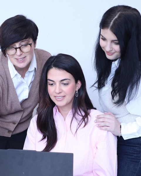 Andriyani, Maria and Tatiana supporting a client together